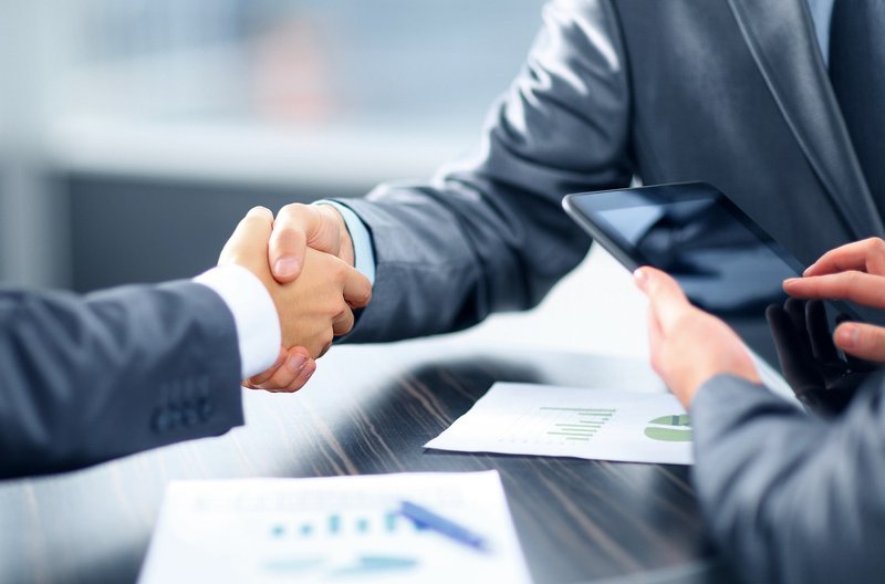 Representative image: business handshake agreement