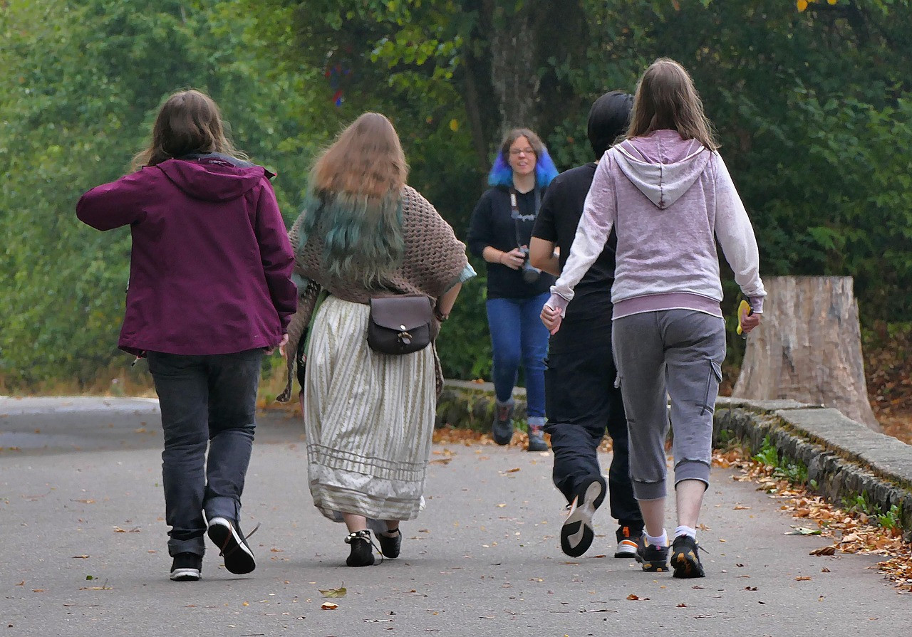 Representative image: women walking in park