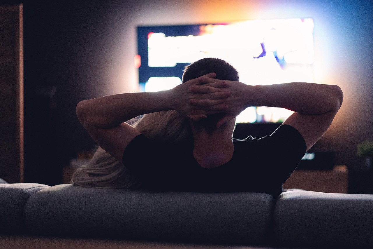Representative image: person watching streaming on television