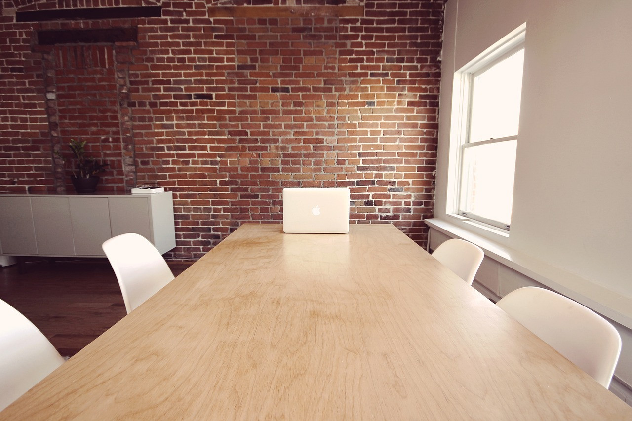 Representative image: office desk laptop empty chair