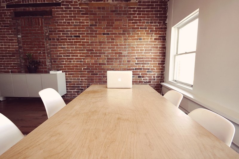 Representative image: office desk laptop empty chair