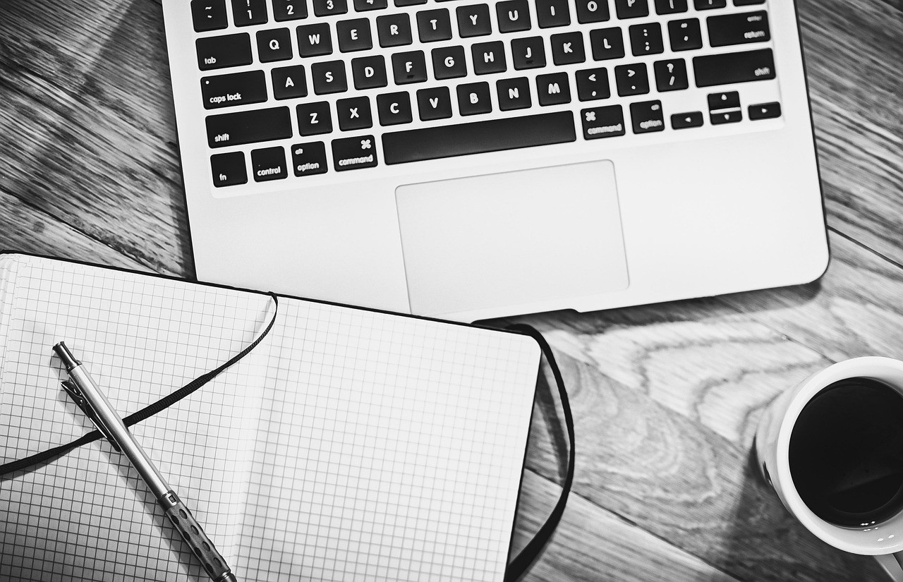 Representative image: office desk with laptop and papers