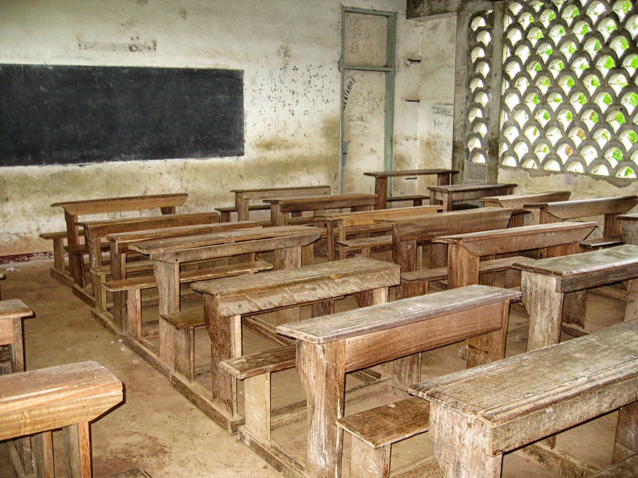 Representative image: empty classroom wooden benches