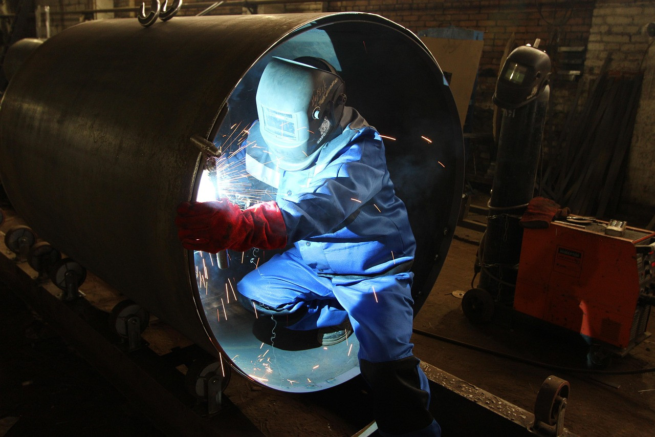 Representative image: factory robot welding