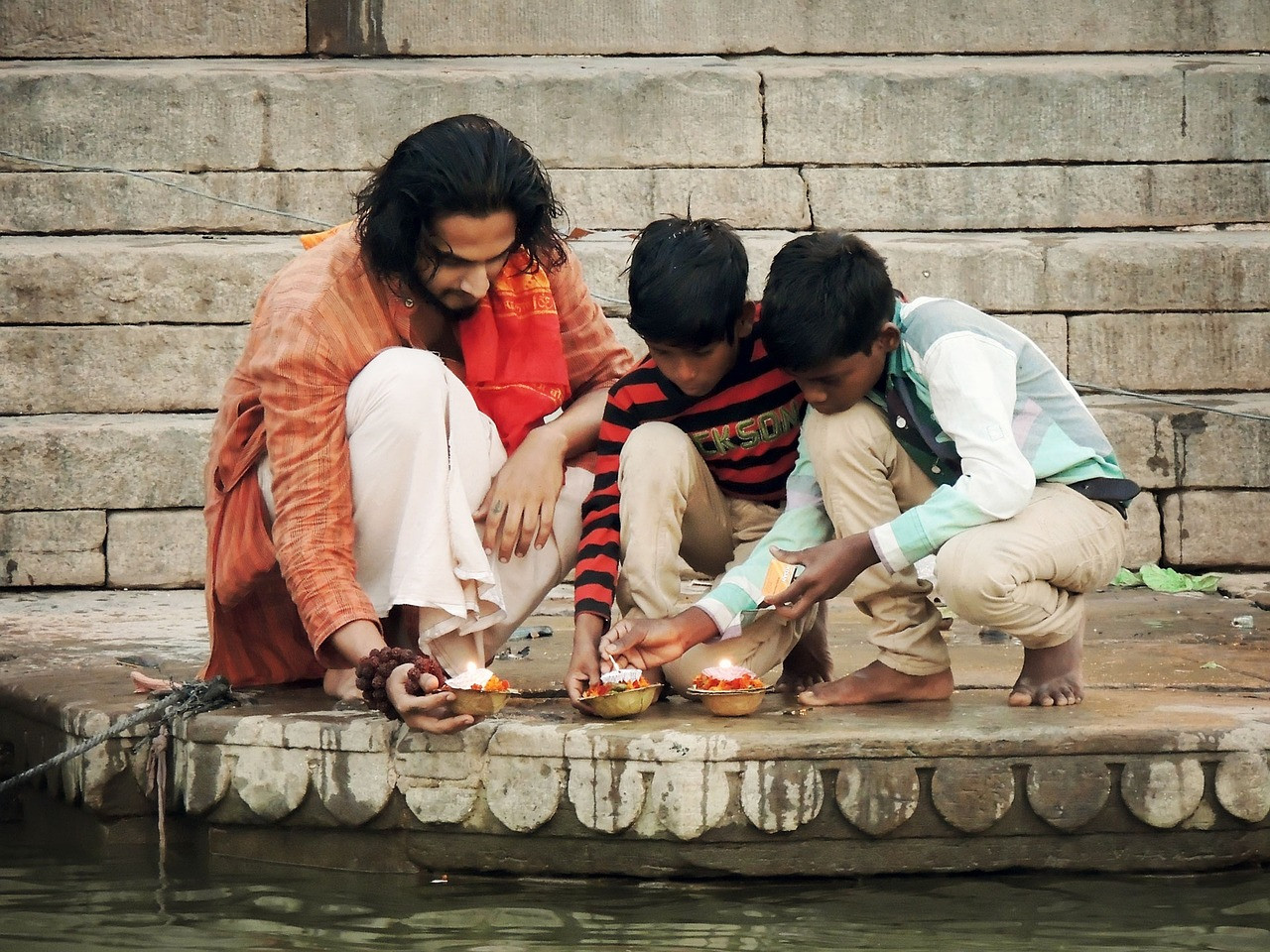 Representative image: oil lamps diya river ghat