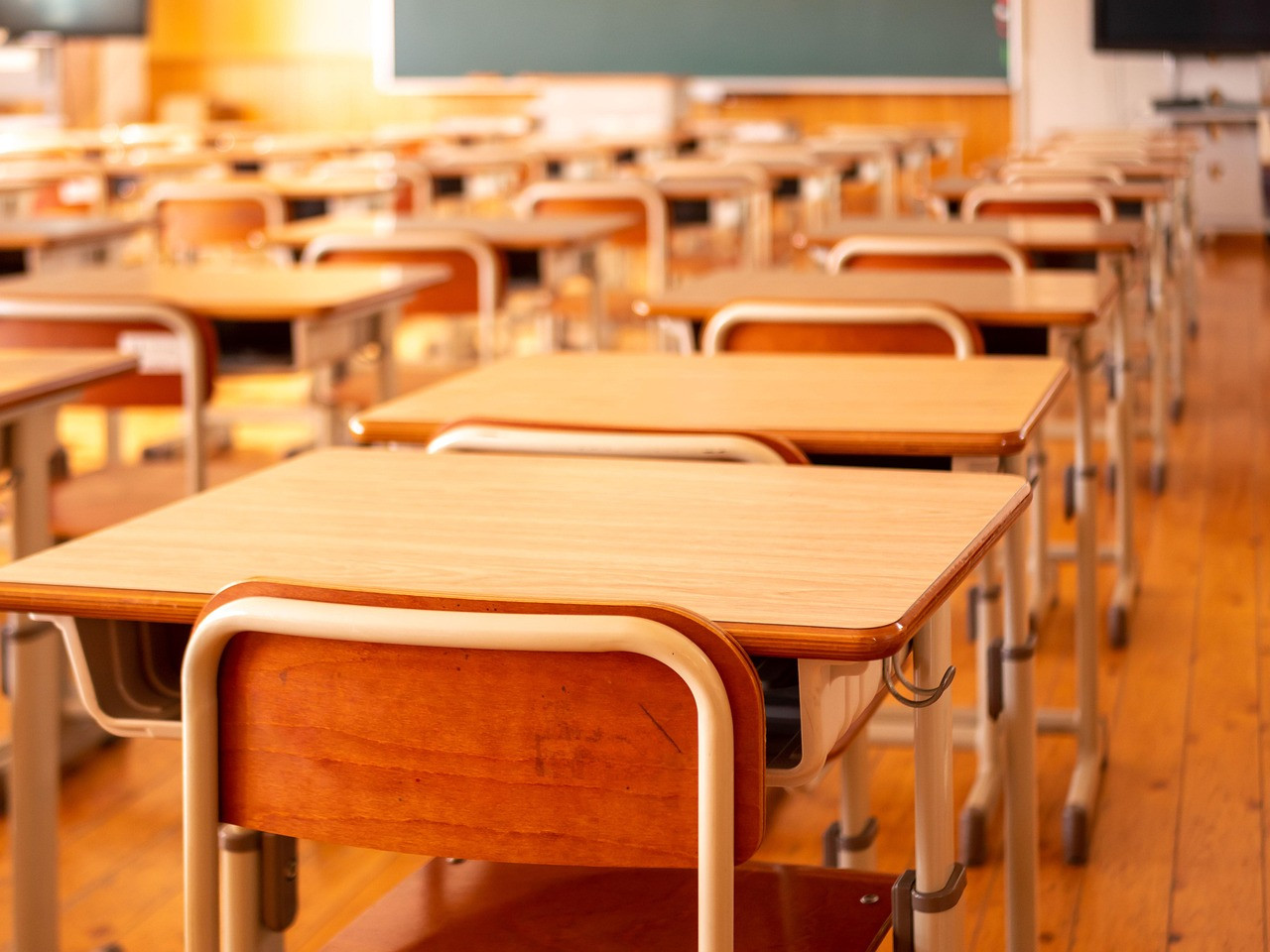 Representative image: empty school classroom desks