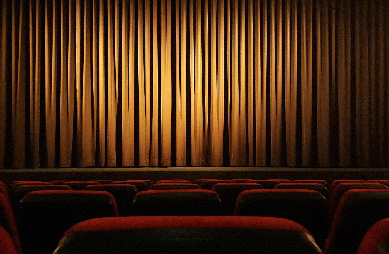 Representative image: theatre stage red curtain