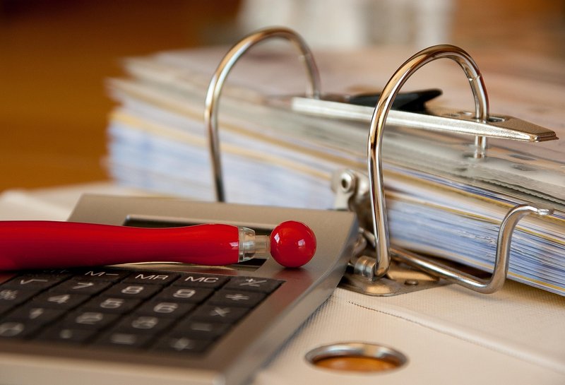 Representative image: invoice paperwork on desk