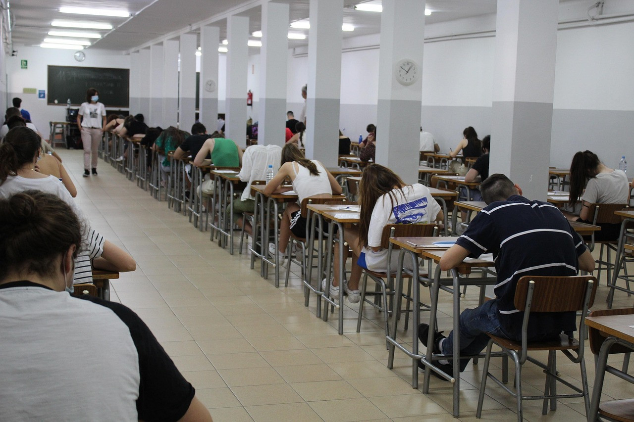 Representative image: students writing an exam