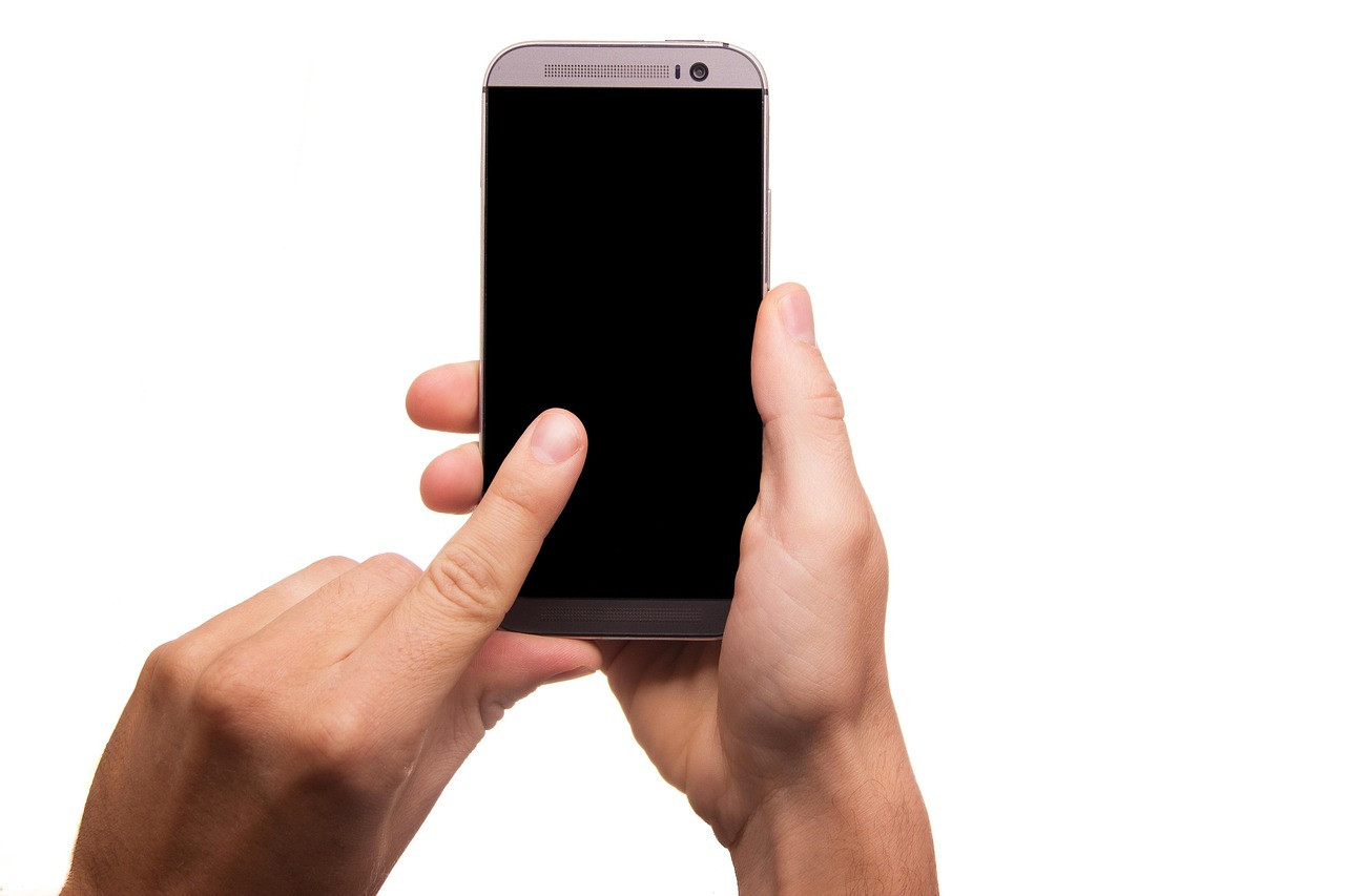 Representative image: hands holding smartphone