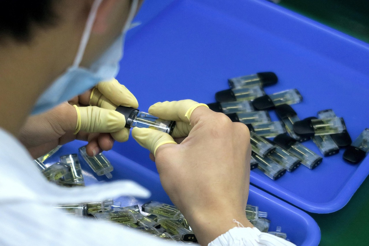 Representative image: factory assembly line workers