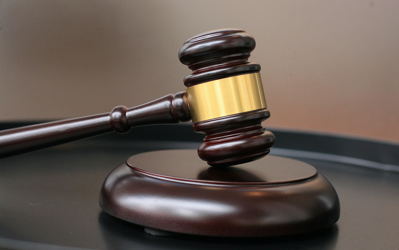 Representative image: courtroom gavel and law books