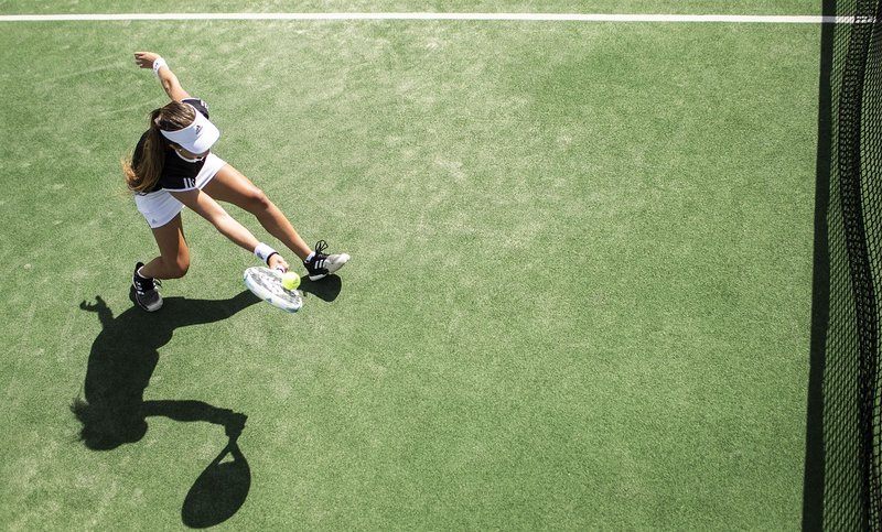 Representative image: tennis racket ball court