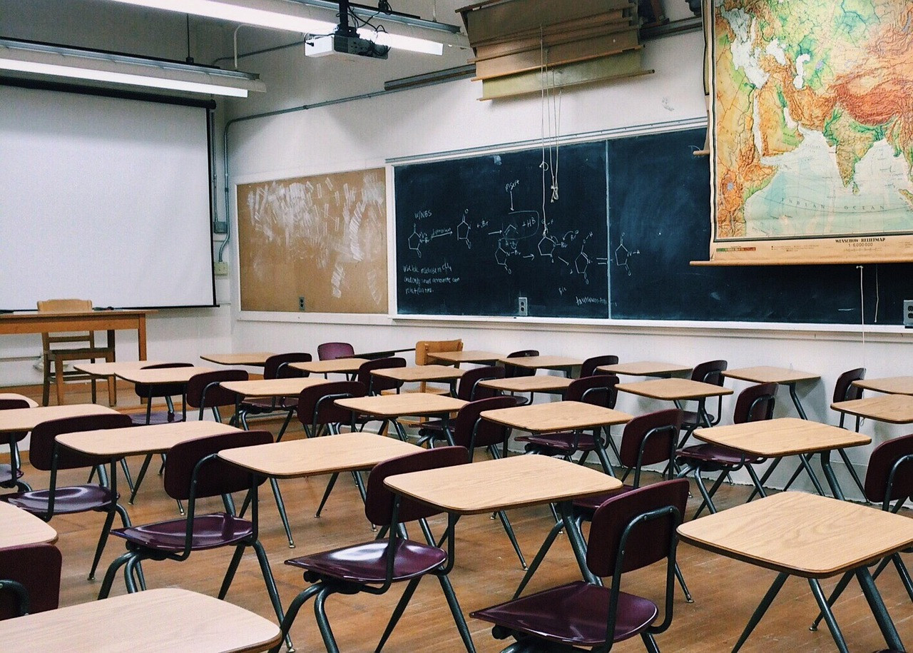 Representative image: empty school classroom desks