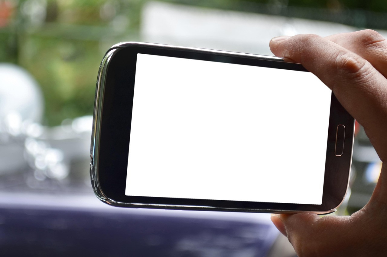 Representative image: hands holding smartphone