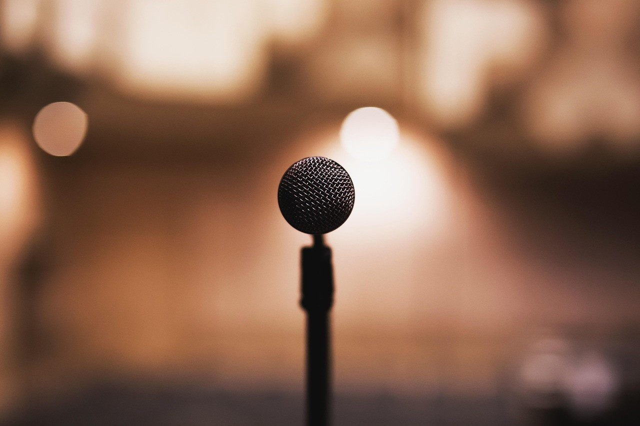 Representative image: stage microphone spotlight