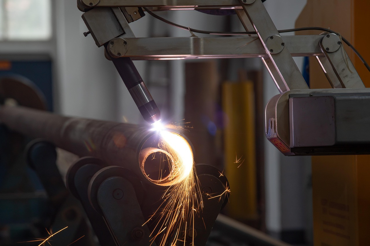 Representative image: factory robot welding