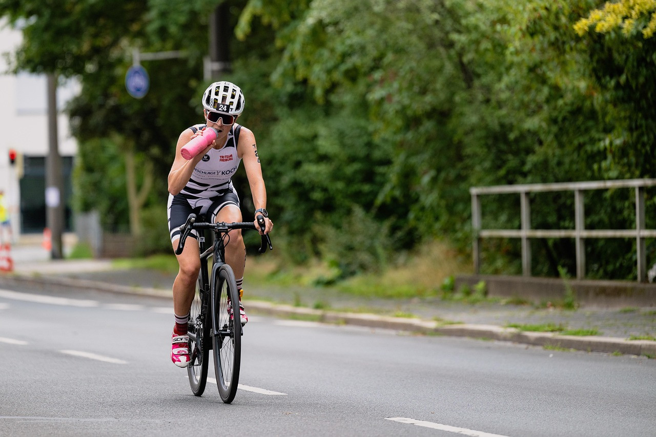 Representative image: people cycling on city road