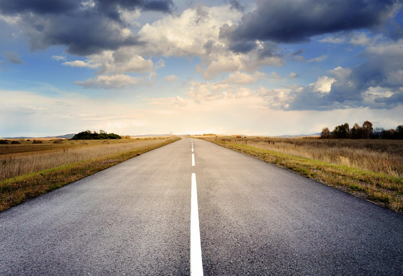 Representative image: highway road at sunset