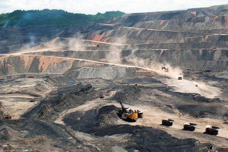 Representative image: open pit mine trucks