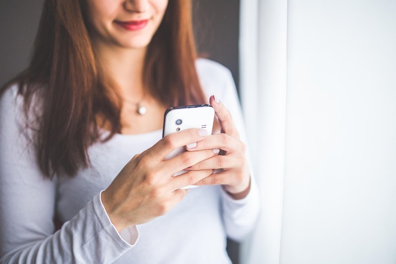 Representative image: hand holding smartphone