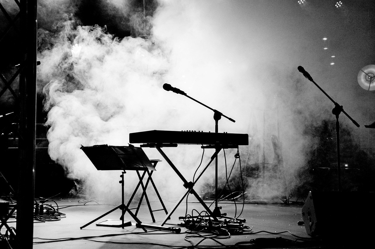 Representative image: concert stage spotlight microphone