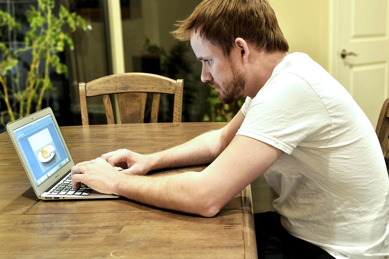 Representative image: person typing laptop