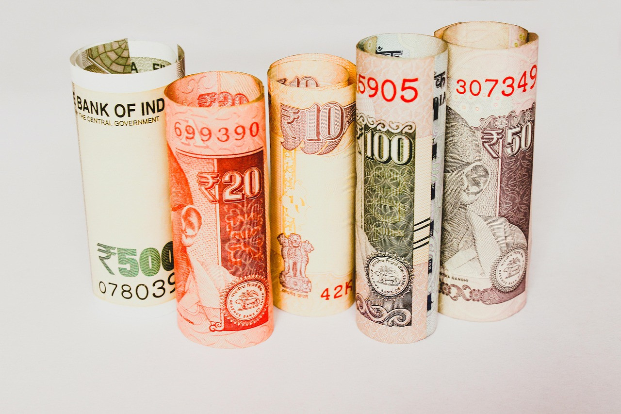 Representative image: rupee notes and bank counter