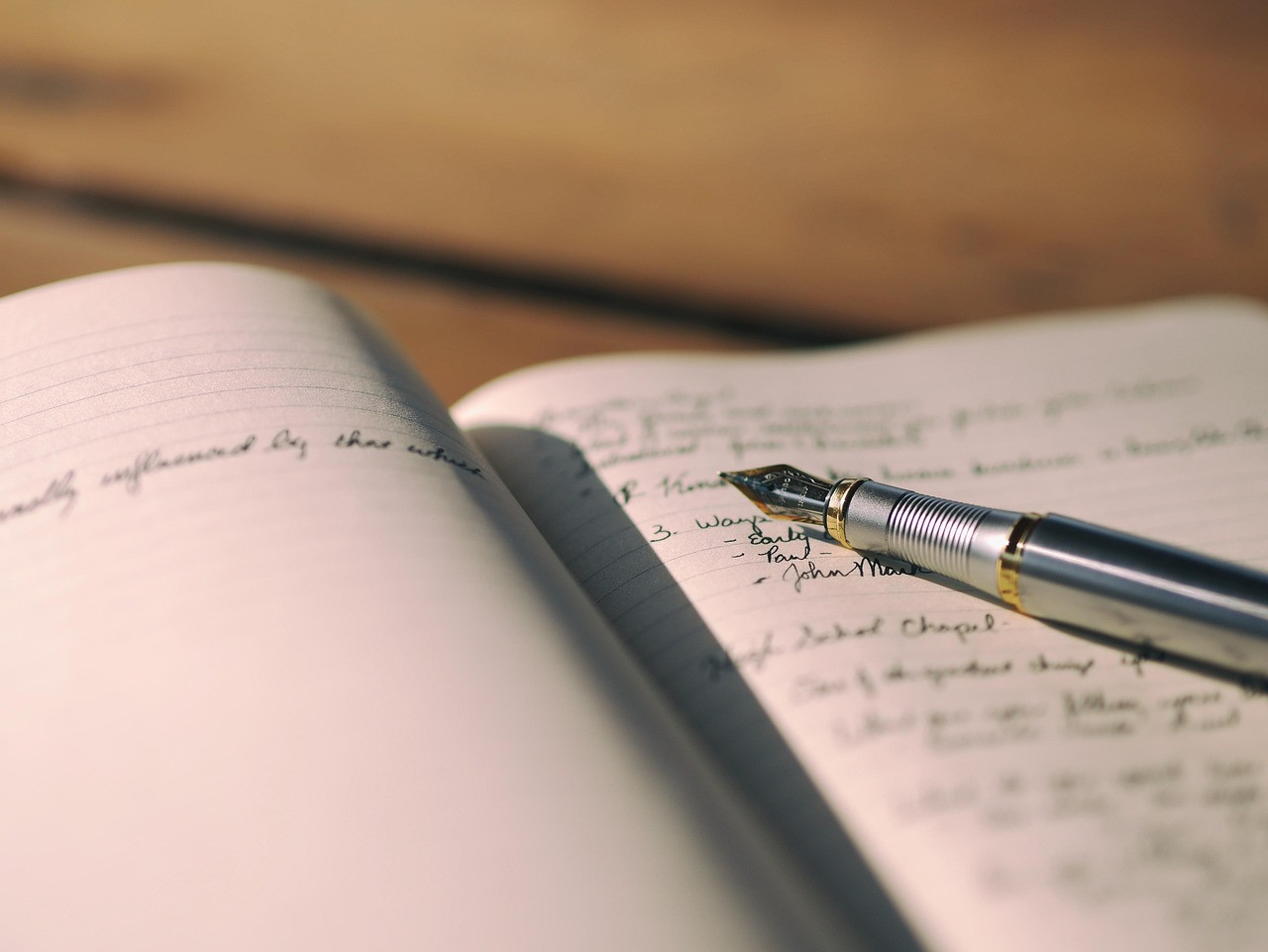 Representative image: open notebook pen