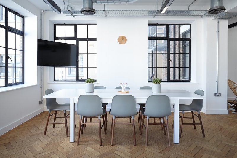 Representative image: conference table flags meeting