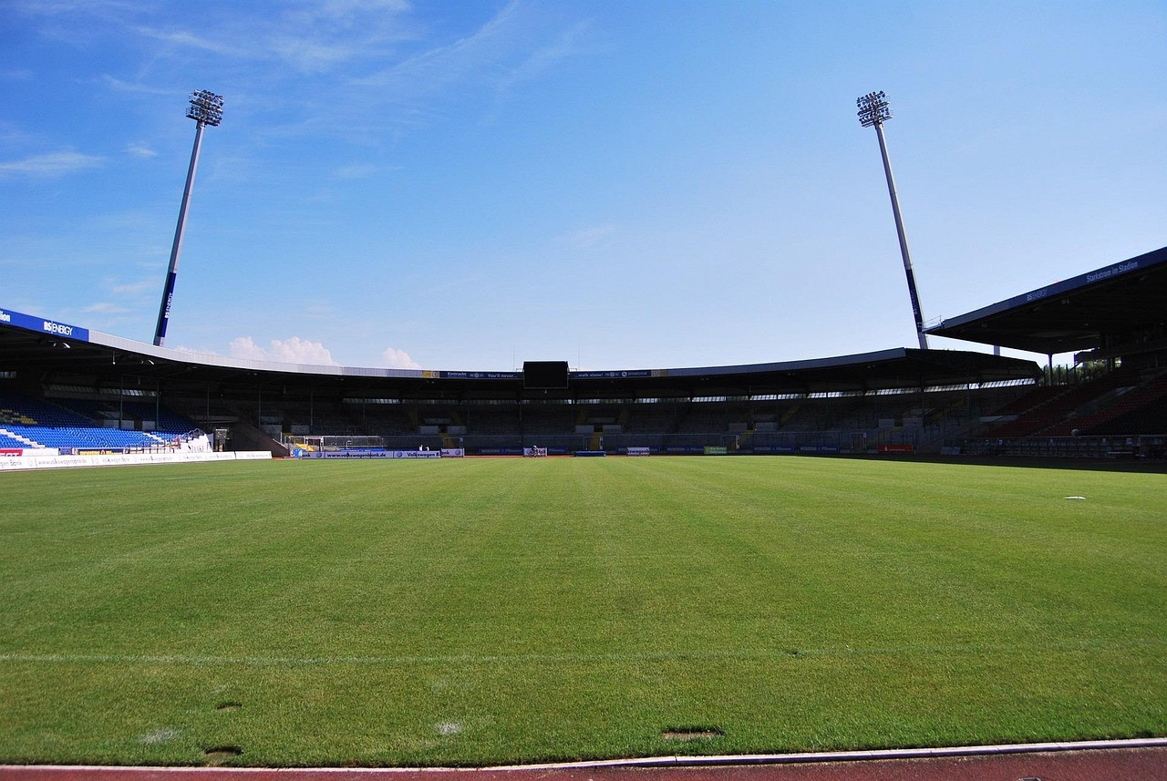 Representative image: empty sports stadium floodlights
