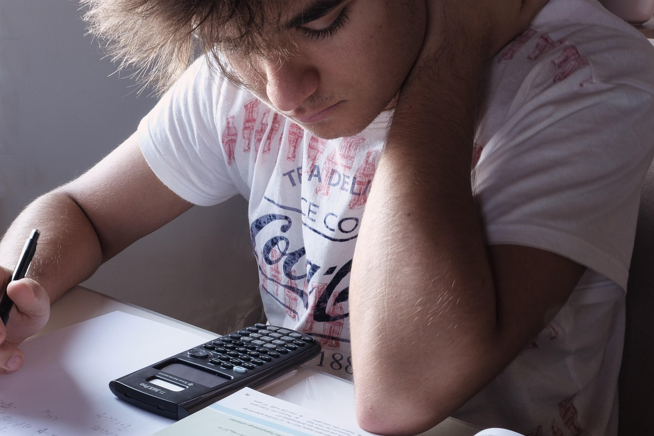 Representative image: students writing an exam