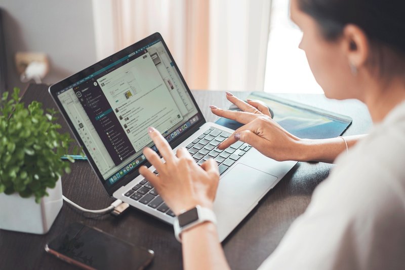 Representative image: woman working at computer office