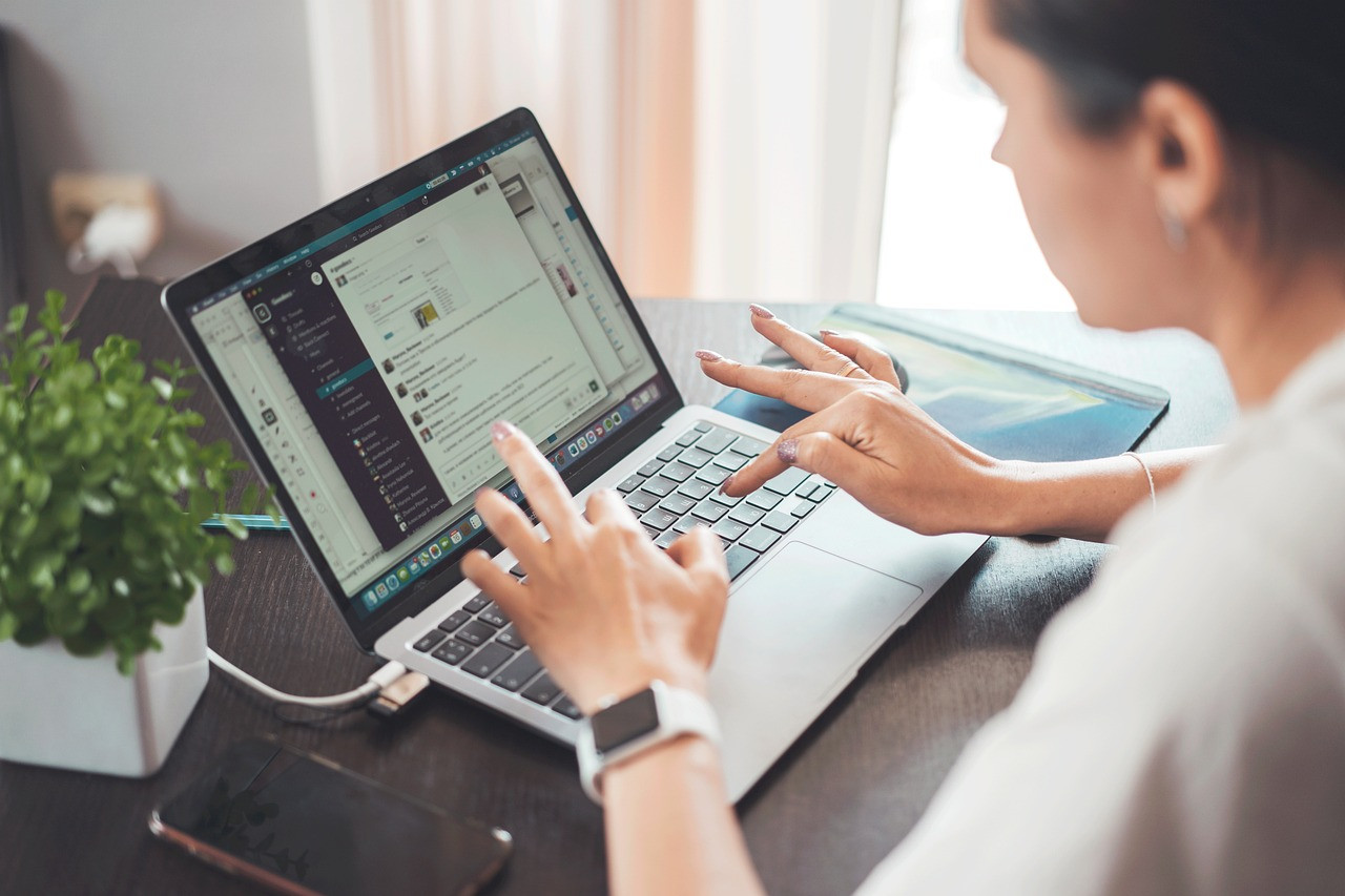 Representative image: woman working at computer office