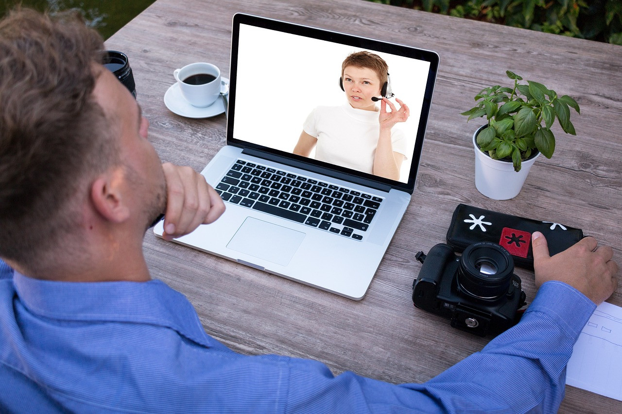 Representative image: office meeting laptop video call
