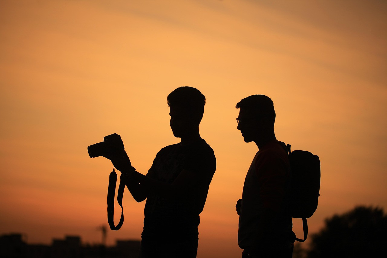 Representative image: tourists with backpacks