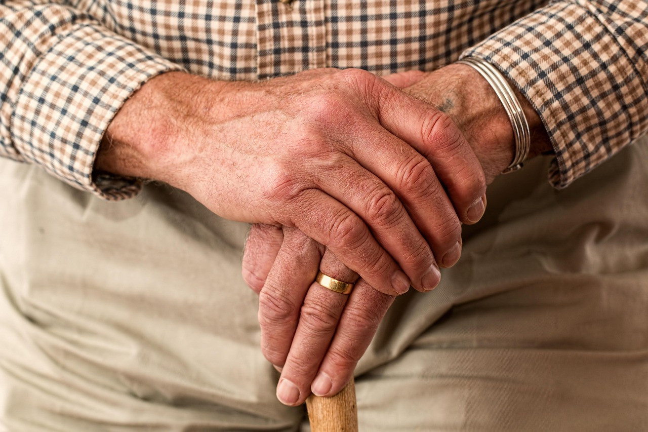 Representative image: elderly hands holding walking stick