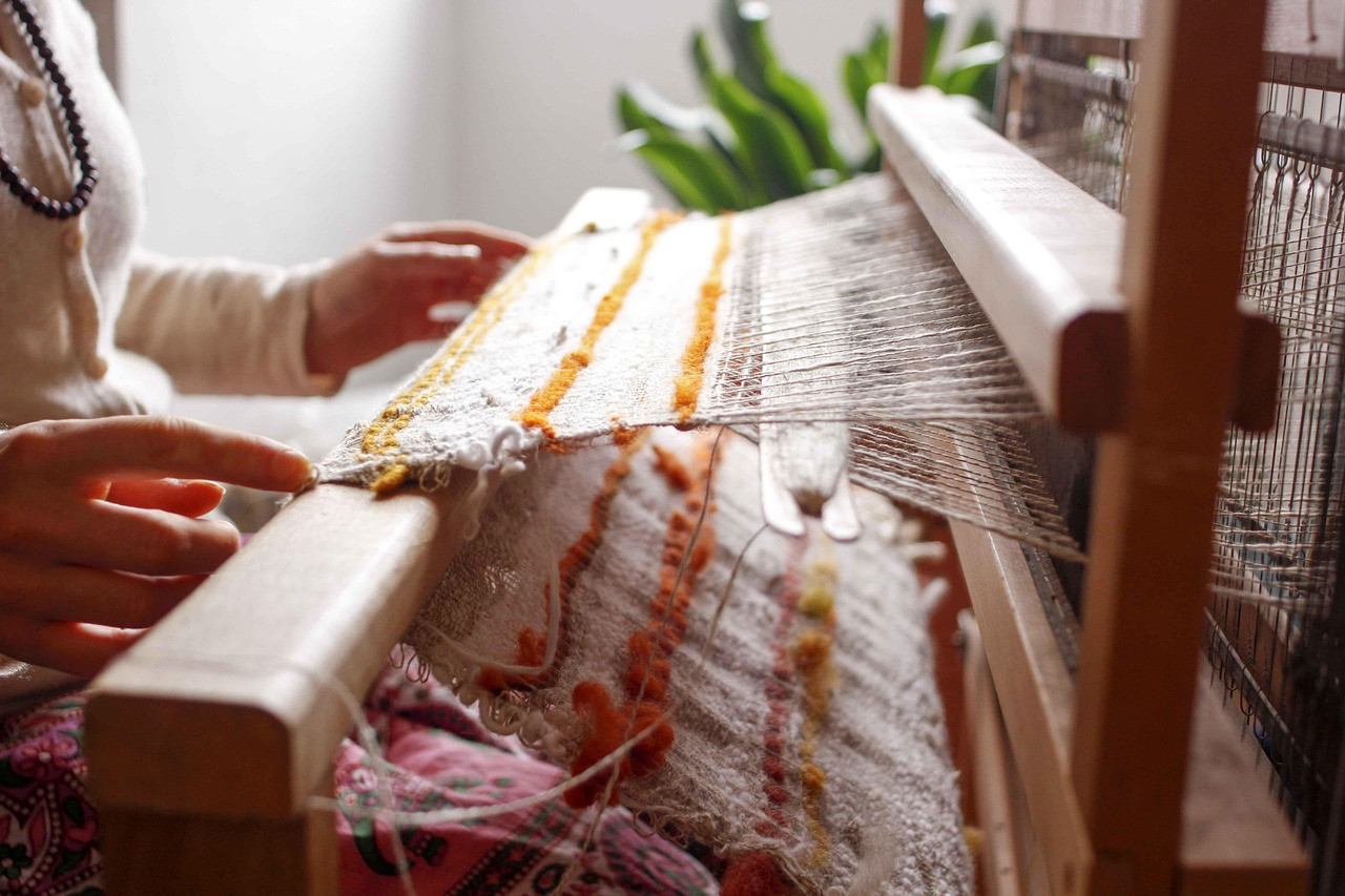Representative image: handloom weaver at wooden loom