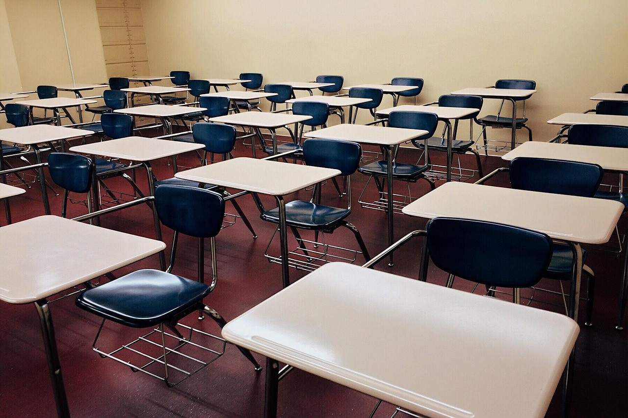 Representative image: empty classroom desks school
