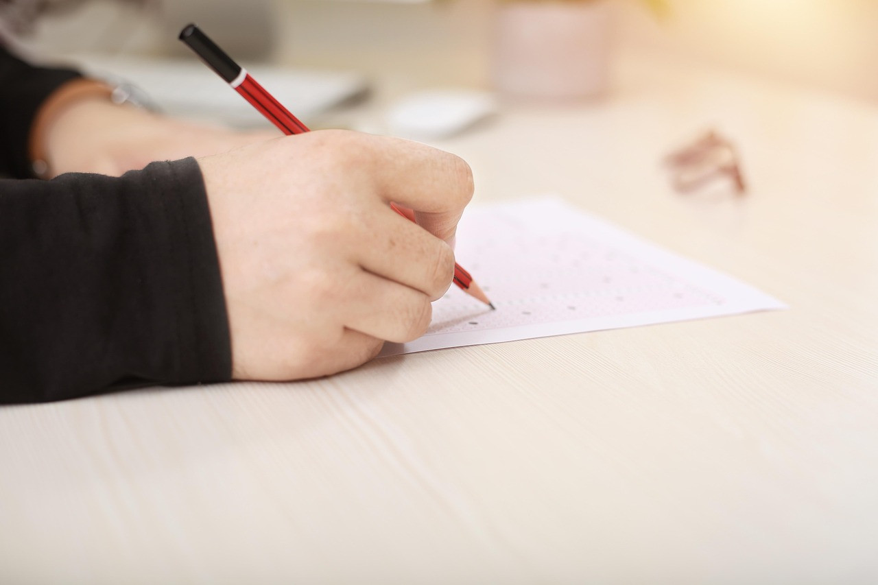 Representative image: students writing an exam
