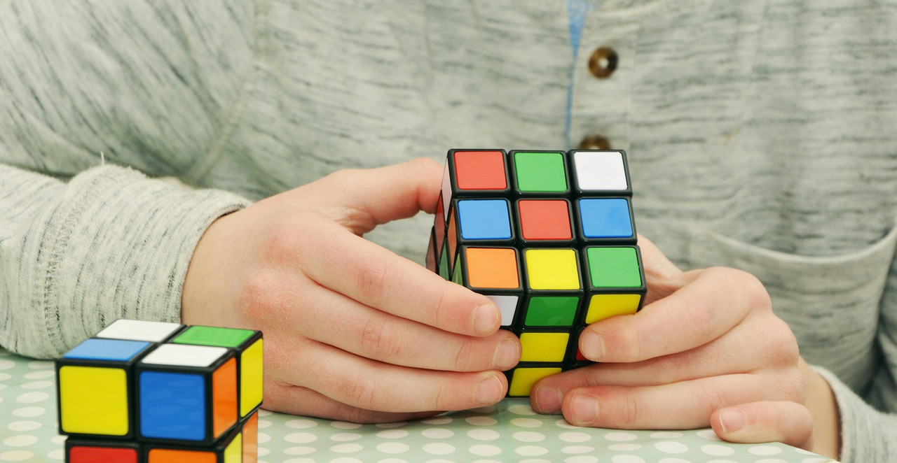 Representative image: smartphone puzzle game hands