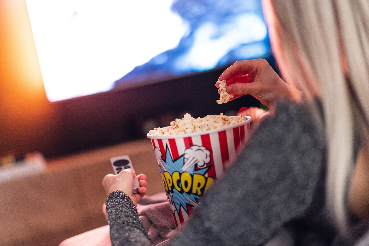 Representative image: person watching movie on television
