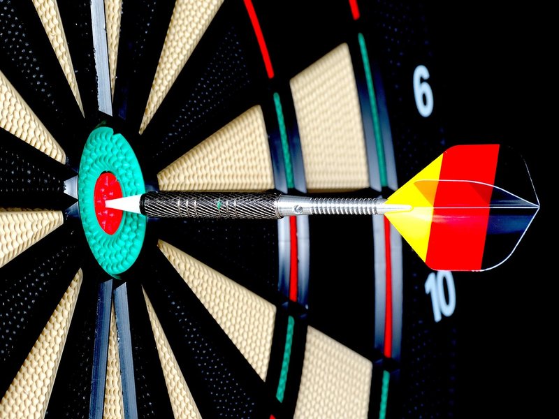 Representative image: dartboard with darts close up
