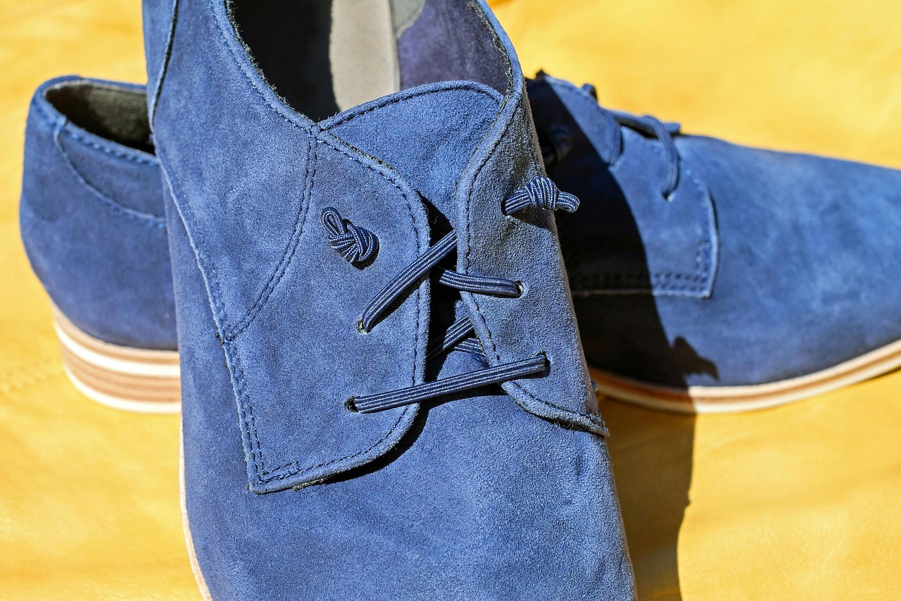 Representative image: grey suede sneakers