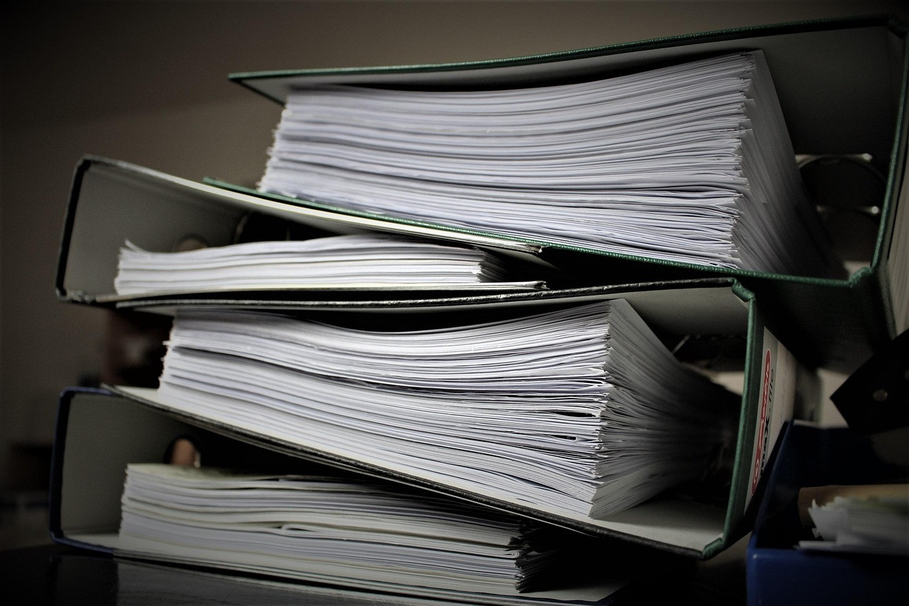Representative image: stack of files documents