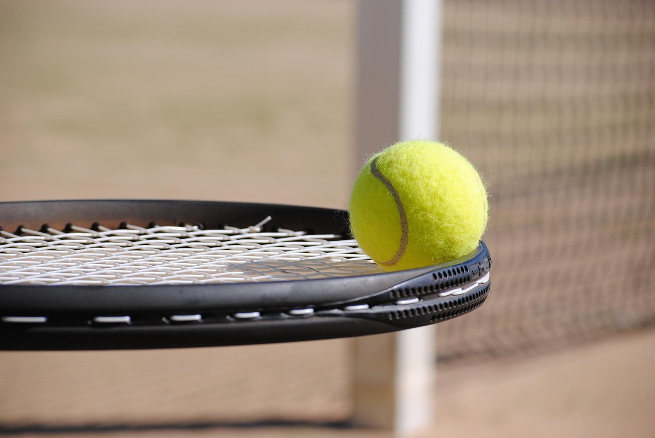 Representative image: tennis racket ball court