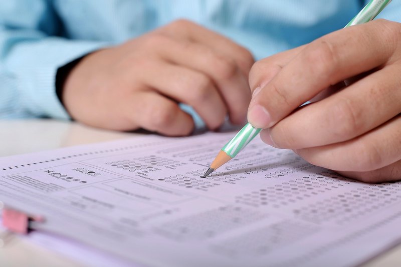 Representative image: students writing an exam