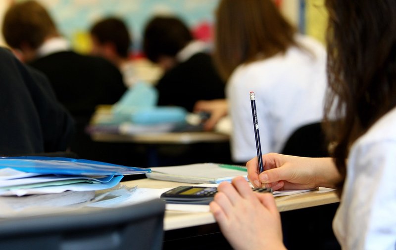 Representative image: students writing an exam