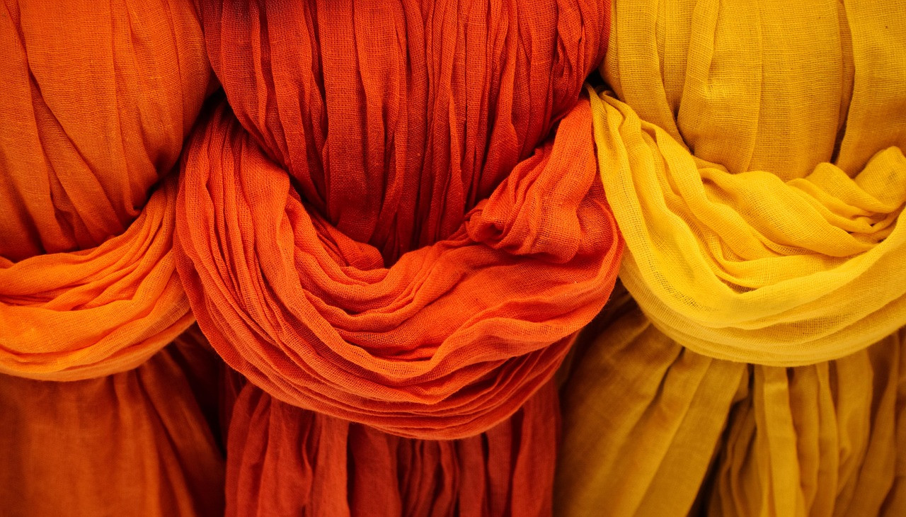 Representative image: colourful fabric rolls in a textile mill