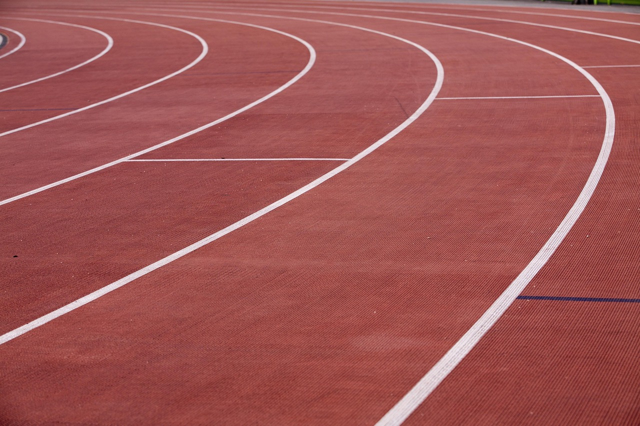 Representative image: empty athletics track lanes